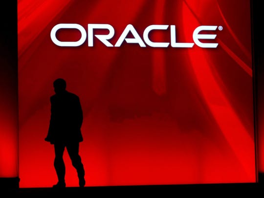 Oracle's then-CEO Larry Ellison walks off stage after delivering his keynote address at the 2008 Oracle OpenWorld conference in San Francisco.