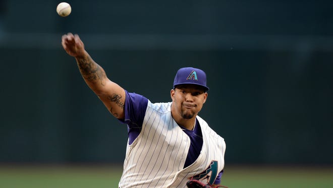 Apr 27, 2017; Phoenix, AZ, USA; Arizona Diamondbacks starting pitcher Taijuan Walker (99) pitches against the San Diego Padres during the first inning at Chase Field.