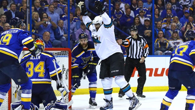 San Jose Sharks right wing Joel Ward (42) celebrates after scoring a goal against the St. Louis Blues in Game 5 of the Western Conference Final at Scottrade Center Monday in St. Louis. San Jose won 6-3.