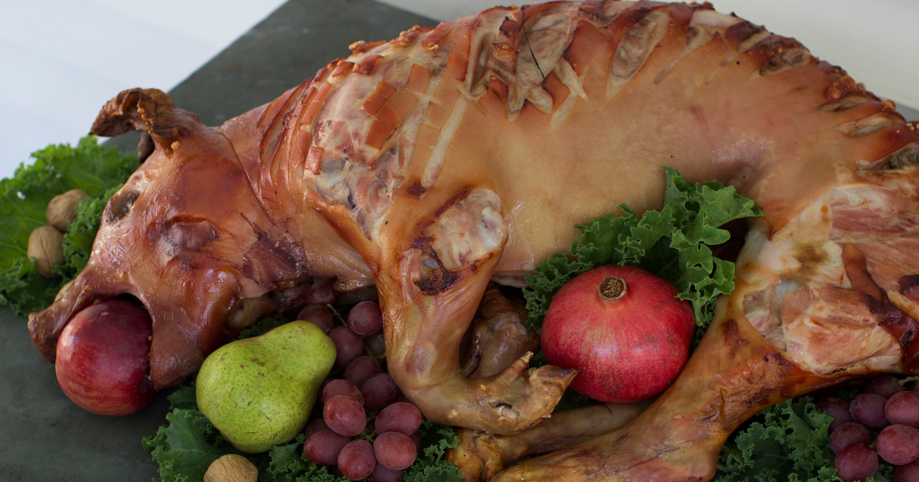 Done with turkey at Thanksgiving? Try roasted pig
