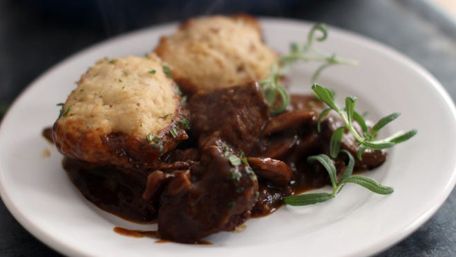 Guinness lamb stew features walnut Irish soda bread dumplings. Taking inspiration from classic Irish ingredients and dishes, this savory lamb stew has a rich broth made from beef stock, Guinness beer and fresh rosemary.