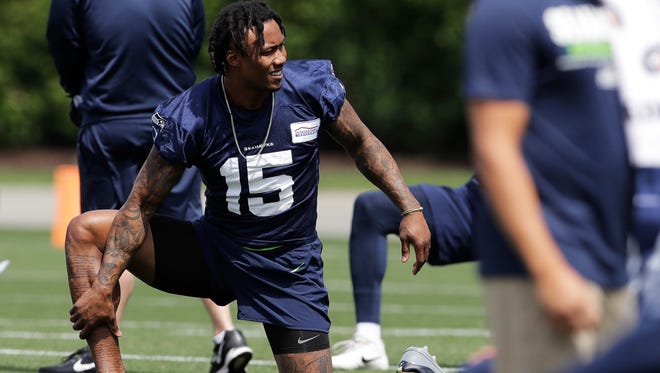 Brandon Marshall stretches during his first offseason practice with the Seahawks on Wednesday in Renton. Marshall received treatment for Borderline Personality Disorder.