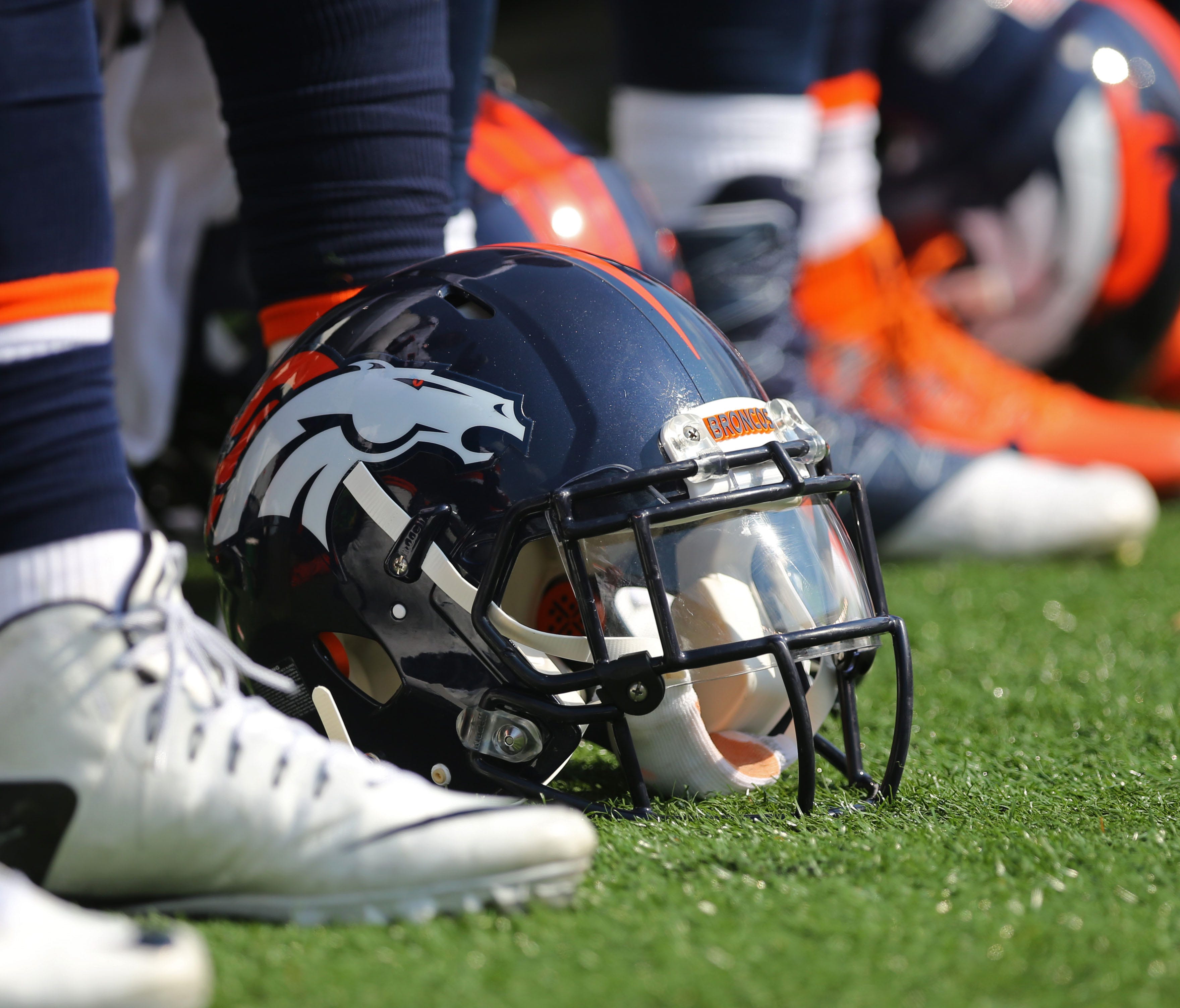 A view of a Denver Broncos helmet on the sidelines at Paul Brown Stadium.