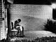 Before dawn, Ali relaxes on the front patio by reading
