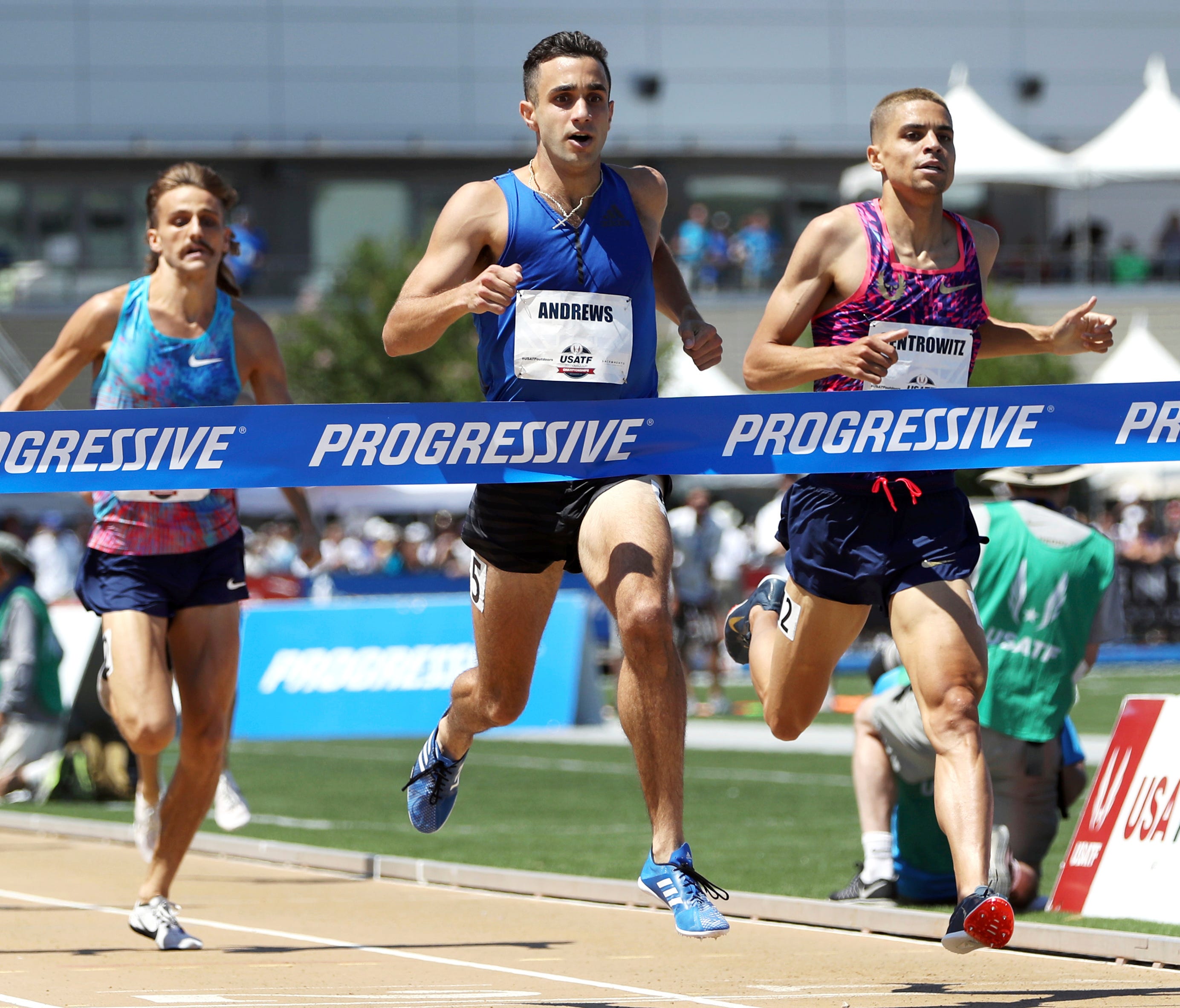 Robby Andrews, second from right, wins the men's 1500 meters ahead of second-place finisher Matthew Centrowitz.