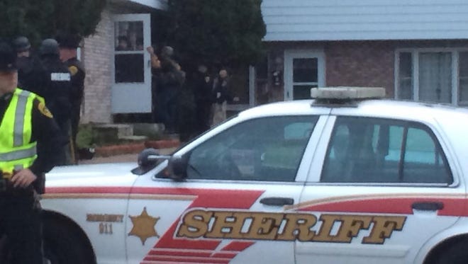 Broome County Sheriff's deputies attempt to make contact with a man believed to be inside an apartment in Endicott with a gun and threatening suicide.