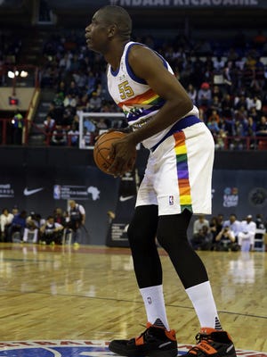 Team Africa's NBA legend Dikembe Motumbo plays Saturday in the NBA Africa Game at Ellis Park Arena in Johannesburg, South Africa Photo/)
