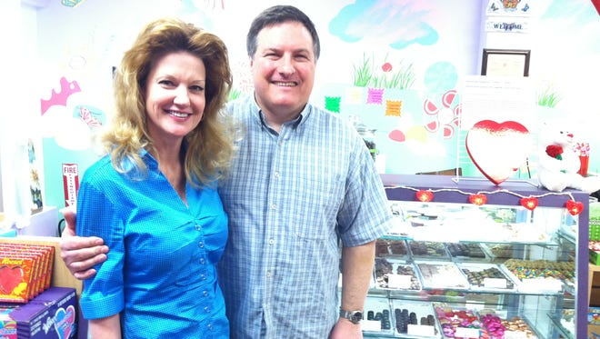 Bethany and Mike Caputo inside their Butterfly Kisses Sweet Shoppe, 12 Amity St. in Spencerport.