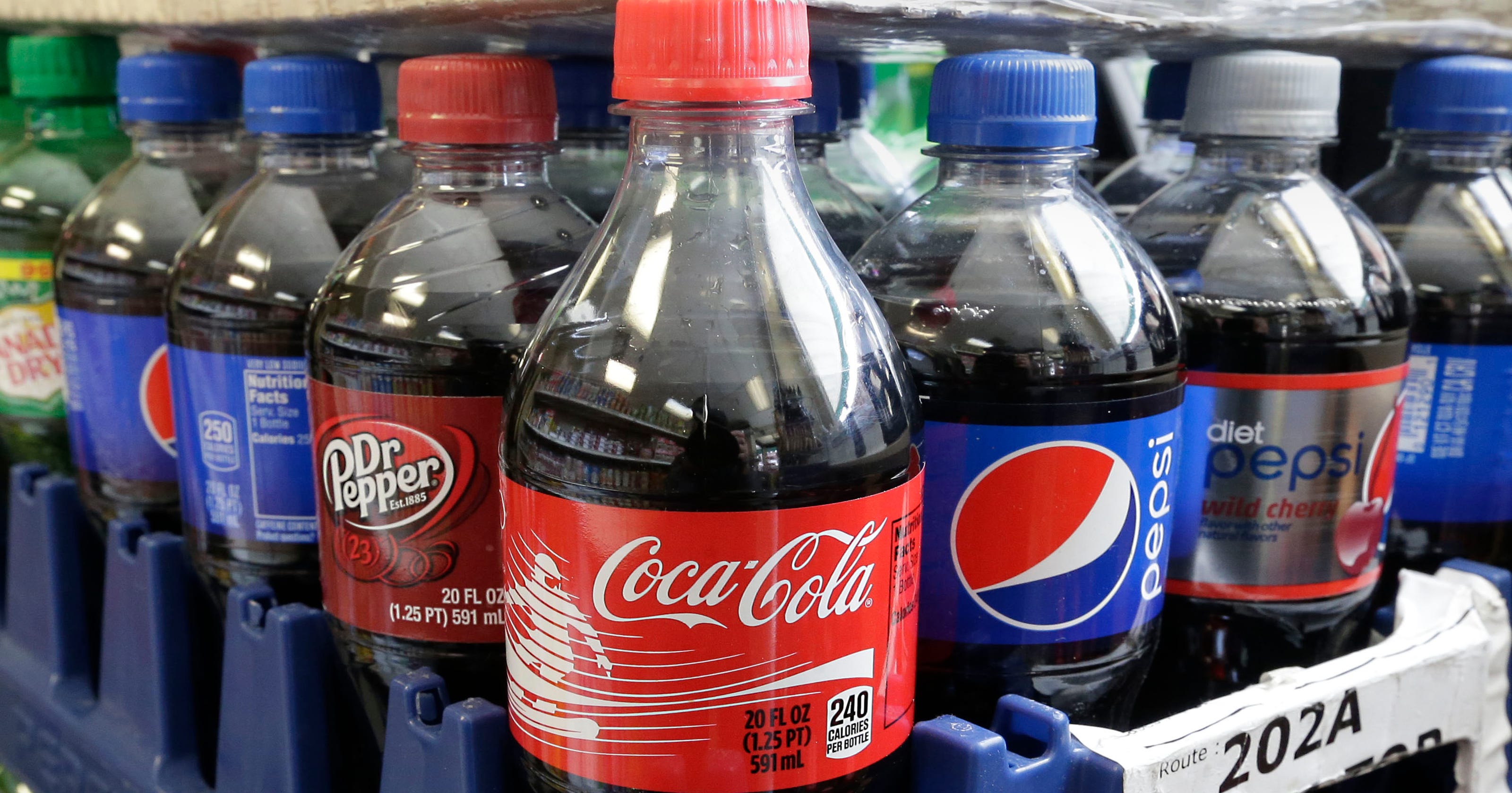 Soda giants to cut calories 20 by 2025