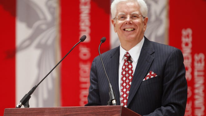 Paul Ferguson smiles at a 2014 press conference announcing his hiring as Ball State president.
