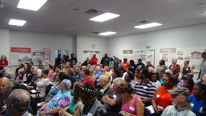 Citizens attending a Race and Reconciliation workshop. Race and Reconciliation is a local group of citizens, educators and professionals working to close the racial divide in Pensacola.
