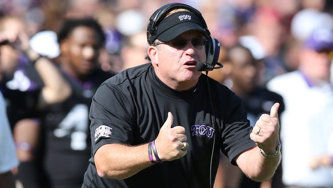 Texas Christian coach Gary Patterson delivers signals from the sideline in the Horned Frogs' game last season against Oklahoma.