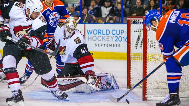 Mar 12, 2016: Arizona Coyotes goalie Mike Smith (41) guards his net as Edmonton Oilers left wing Patrick Maroon (19) tries to score during the second period at Rexall Place.
