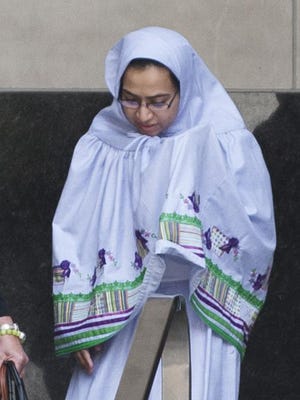 Fatema Dahodwala leaves federal court after being arraigned in a female genital mutilation case.