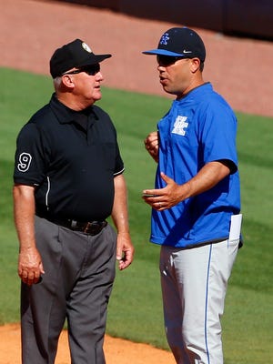 Kentucky coach Nick Mingione, right, challenges a call by umpire Tony Walsh during the fourth inning of the Southeastern Conference NCAA college baseball tournament, Friday, May 26, 2017, in Hoover, Ala.