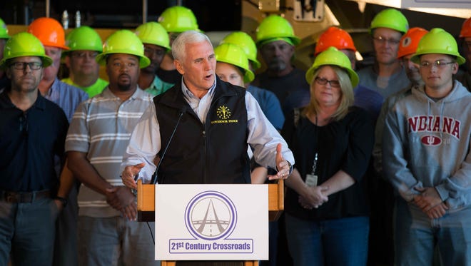 Indiana Gov. Mike Pence announced his 21st Century Crossroads plan, calling for $1 billion to be spent on infrastructure over four years, pending legislative approval, Tuesday, Oct. 13, 2015. Pence's plan does not call for a raise in taxes, but it was unclear during a question-and-answer session during a press conference at INDOT Traffic Management Center where the funds would come from.
