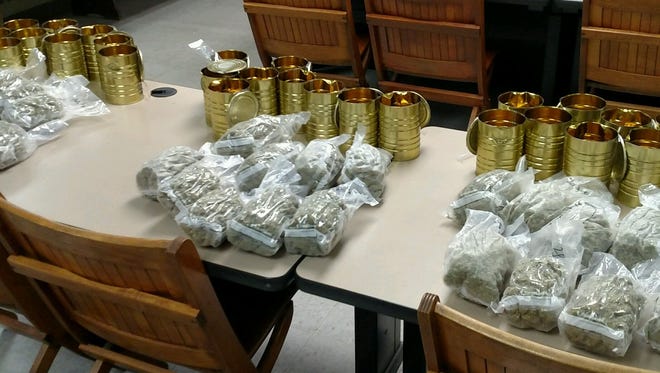 Four people face charges after a drug task force uncovered roughly eight pounds of marijuana valued at about $30,000.