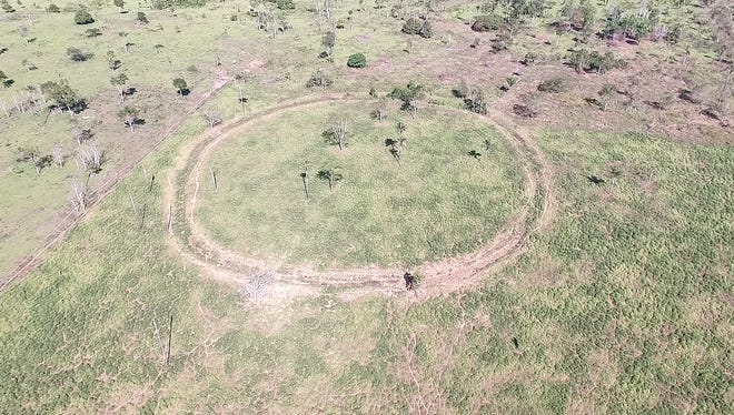 A circular enclosure that's about 450 feet diameter sits on a hilltop in the Amazon.
