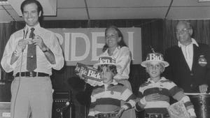 Biden stands on stage with his wife, Jill, and sons Hunter, left, and Beau, along with his father, Joe Biden Sr., during a campaign event in 1988.
