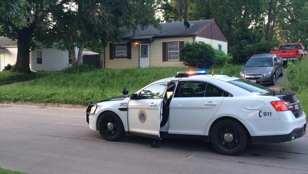 Police respond to a shooting in the 1500 block of East Bell Avenue on June 8, 2015.