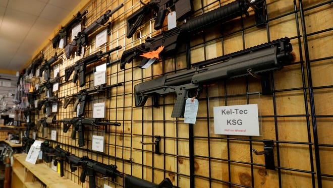 Guns display for sale Tuesday at Central Wisconsin Firearms in downtown Wausau.