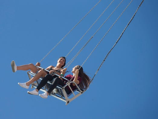 Noelle Weintraub, 14, left, and Alli Meisel, 14, ride