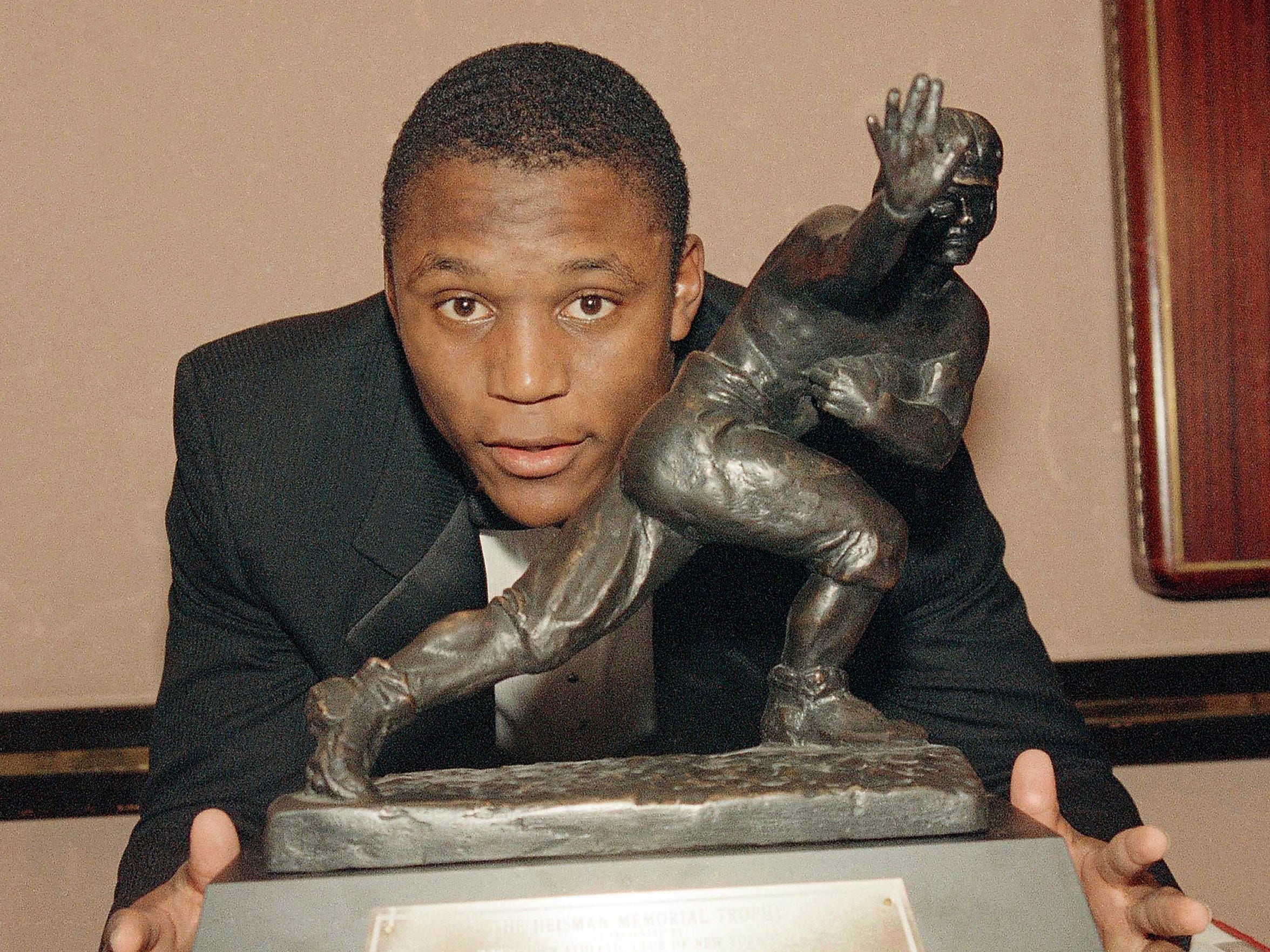 Oklahoma State running back Barry Sanders poses with