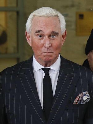 In this Feb. 1, 2019 photo, former campaign adviser for President Donald Trump, Roger Stone, leaves federal court in Washington.