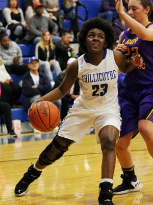 Chillicothe's Essence Devlin dribbles past a defender earlier this season at Chillicothe High School. Devlin and the Cavaliers earned a No. 1 seed in Sunday's Southeast District tournament draw.