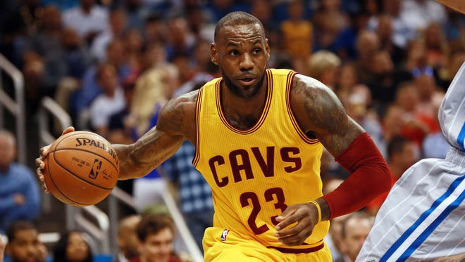 Cleveland Cavaliers forward LeBron James (23) drives to the basket.