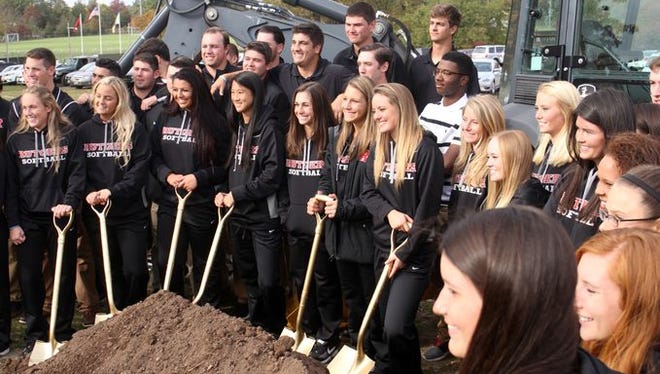 Members of the Rutgers baseball and softball teams took part in a ceremonial groundbreaking for the new training facility in October.