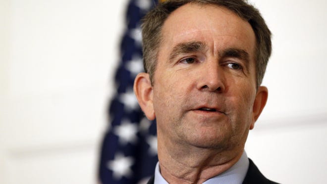 FILE - In this Feb. 2, 2019 file photo, Virginia Gov. Ralph Northam speaks during a news conference in the Governor's Mansion in Richmond, Va. Northam clung to his office Tuesday, Feb. 5, amid intense political fallout over a racist photo in his 1984 medical school yearbook and uncertainty about the future of the state's government. (AP Photo/Steve Helber, File)