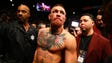 Conor McGregor reacts following his loss against Nate