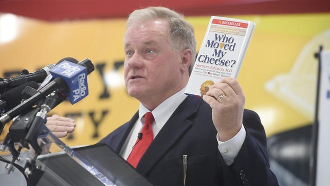 State Sen. Scott Wagner holds up a book "Who Moved My Cheese?" relating it to embracing change on Wednesday Jan. 11, 2017 at his York County waste and recycling business, Penn Waste Inc. in East Manchester Township.