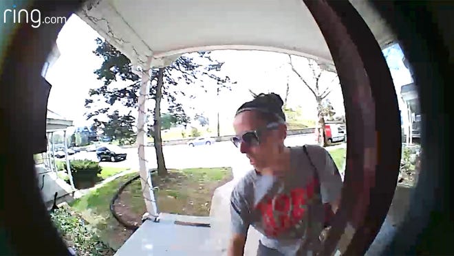 A package is stolen from a home on North George Street on Saturday April 28 and was recorded by a video doorbell.