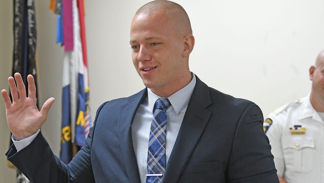 Jordan Moore was sworn in Monday morning as Mansfield newest police officer.