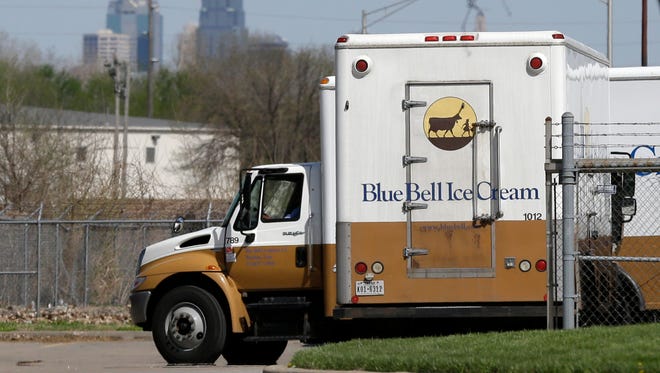 FILE -In this April 10, 2015 file photo, Blue Bell delivery trucks are parked at the creamery's location in Kansas City, Kansas. Blue Bell ice cream had evidence of listeria bacteria in its Oklahoma manufacturing plant as far back as March 2013, a government investigation released Thursday says. The company then continued to ship ice cream produced in that plant after what the Food and Drug Administration says was inadequate cleaning. (AP Photo/Orlin Wagner, File)