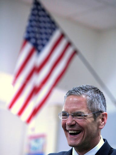 Mark Schauer shares a laugh with third-graders.