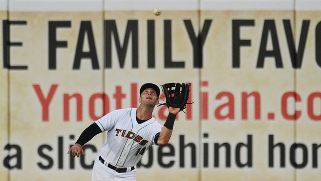 Norfolk Tides left fielder Christian Walker snags a fly ball during the Tides game with the Scranton/Wilkes-Barre Railriders on Friday, May 27, 2016 in Norfolk, Va. Walker spent time with the Delmarva Shorebirds before moving up to the Orioles AAA Norfolk team.