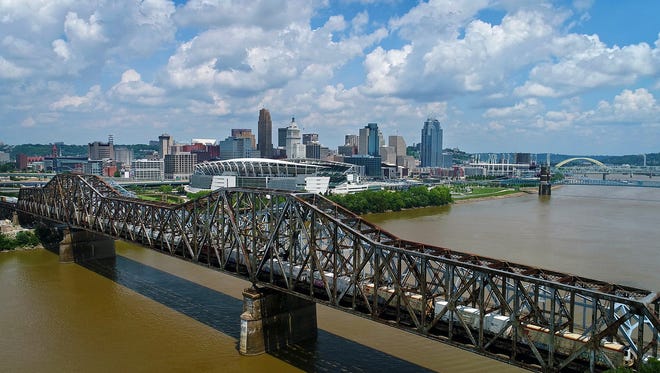 Drone footage over the Ohio River shows the Cincinnati, Ohio skyline from Covington, Kentucky, on Thursday, Aug. 3, 2017. (Carrie Cochran & Sam Greene / USA Today Network)