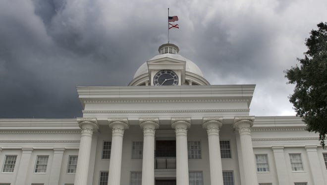 Storm clouds build over the Alabama State Capitol Building in Montgomery, Ala. on July 23, 2015.