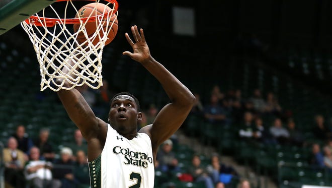 CSU forward Emmanuel Omogbo lays the ball up for a basket during a Dec. 9 win over Arkansas-Fort Smith at Moby Arena. Omogbo returned Tuesday from a trip home to Maryland to mourn the deaths of his parents and two other relatives in a house fire and is expected to play for the Rams on Wednesday night in a home game against San Jose State.