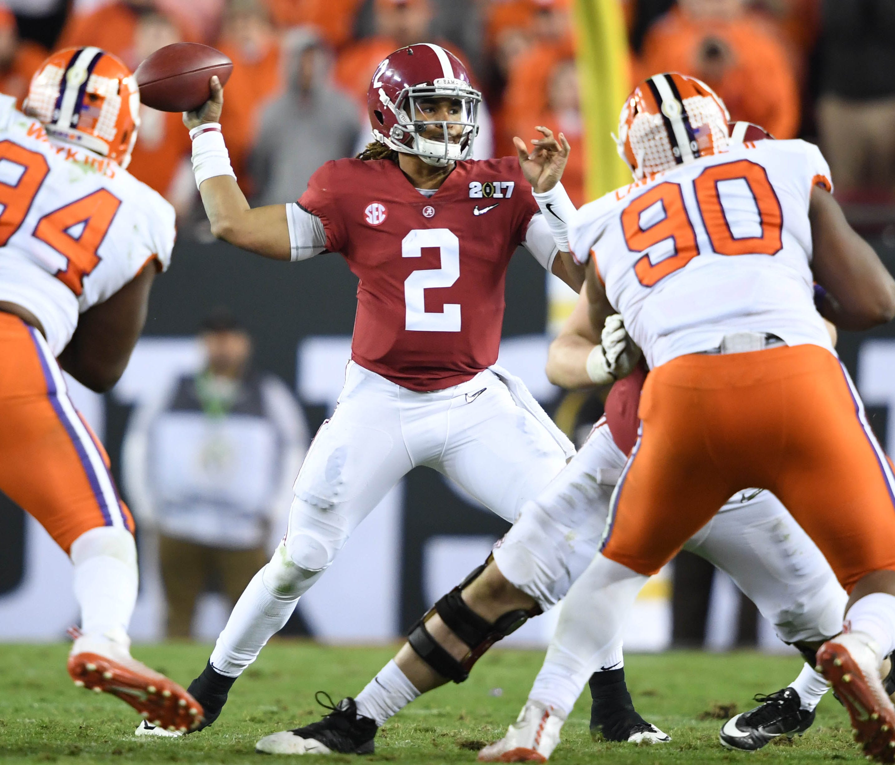 Alabama quarterback Jalen Hurts looks to pass against Clemson in the the 2017 College Football Playoff championship game.