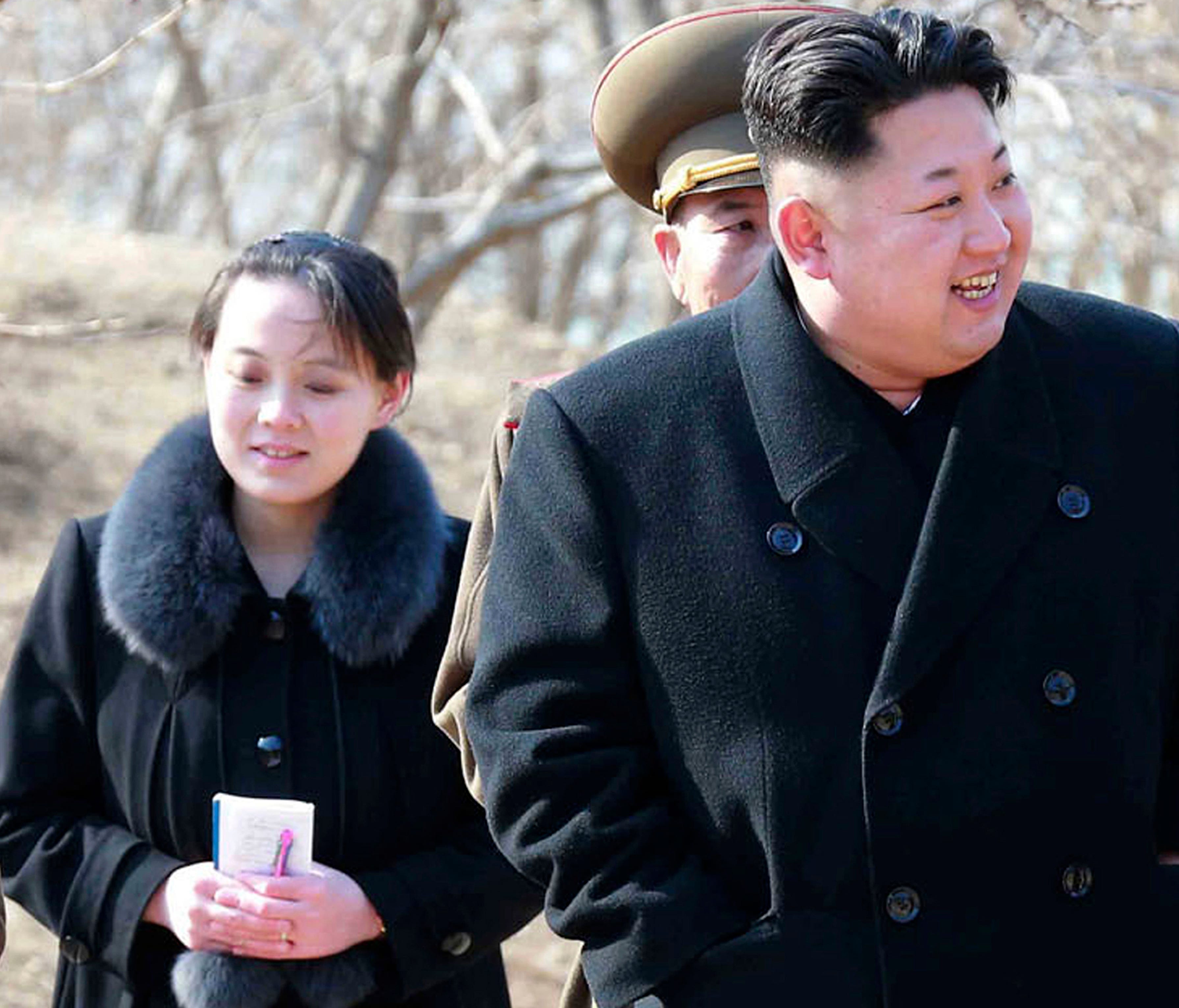 This 2015, file photo provided by the North Korean government shows North Korean leader Kim Jong Un and his sister Kim Yo Jong, left, during their visit to a military unit in North Korea. South Korea's Unification Ministry said North Korea informed W