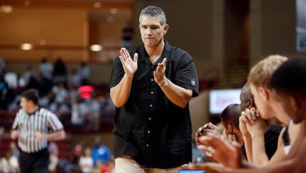 South Carolina's head coach Frank Martin claps for his team during their game against Cornell during the first half at the Charleston Classic NCAA college basketball tournament in Charleston, S.C.,Thursday, Nov. 20, 2014.