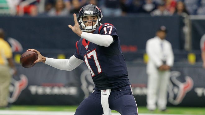 Brock Osweiler of the Houston Texans throws a hail mary against the San Diego Chargers to end the game at NRG Stadium on Nov. 27.