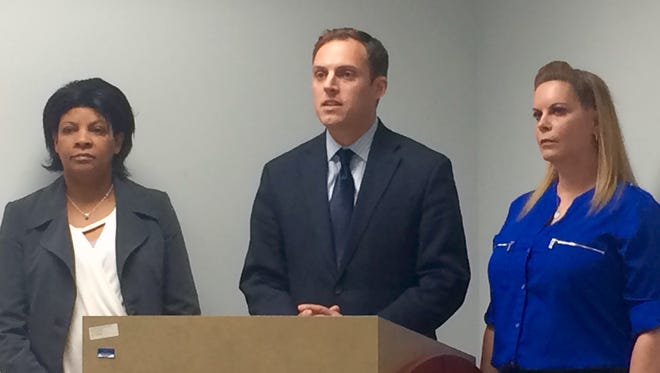 Chillicothe Mayor Luke Feeney and Cheryl Beverly, left, and Michelle McAllister spoke during a Protect Our Care Ohio press conference about the impact of Medicaid and Medicaid expansion.