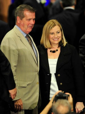 Mayor Megan Barry, right, has a picture taken with predecessor Karl Dean during her inaugural ceremony at Music City Center on Sept. 25.