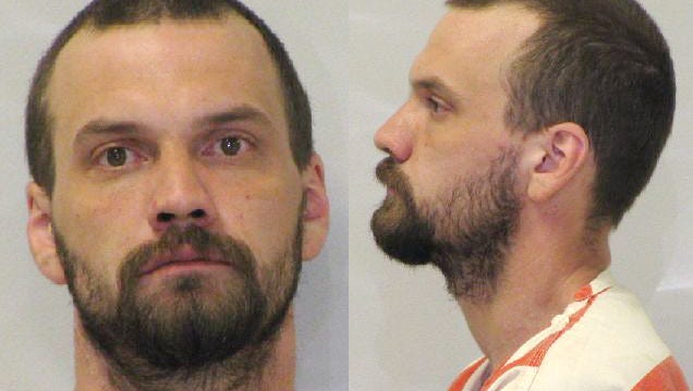 In this undated photo released by the Allegan County Sheriff’s Department, Corey Lee Lavalley is shown. Authorities say Lavalley, 32, fatally shot a woman and her two children before returning to their mobile home in Dorr Township, Mich., and setting it ablaze.