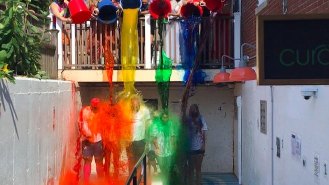 For their Ice Bucket Challenge, Curaleaf employees at the Provincetown store on Commercial Street got doused in rainbow-colored "Pride" water by celebrity drag performers.